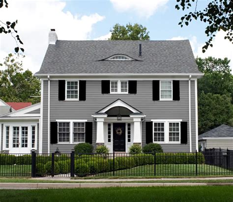 grey house metal roof|grey houses with black shutters.